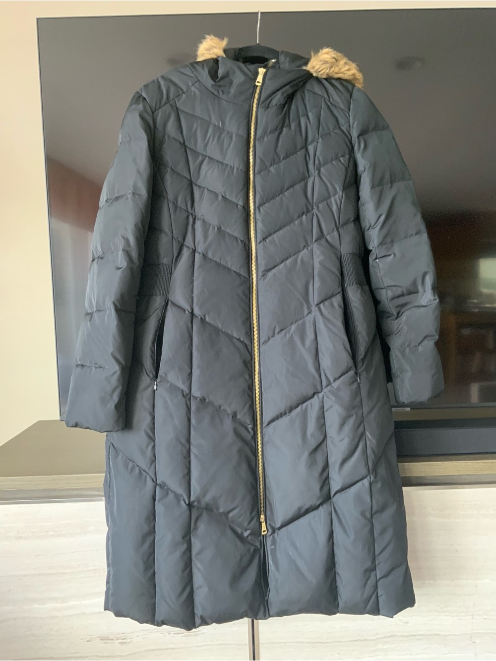 Black Long Quilted Hooded Coat with Faux Fur Trim